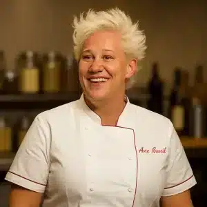 Celebrity chef Anne Burrell in a quiet kitchen moment, reflecting her legacy and the recent news surrounding the anne burrell cause of death.