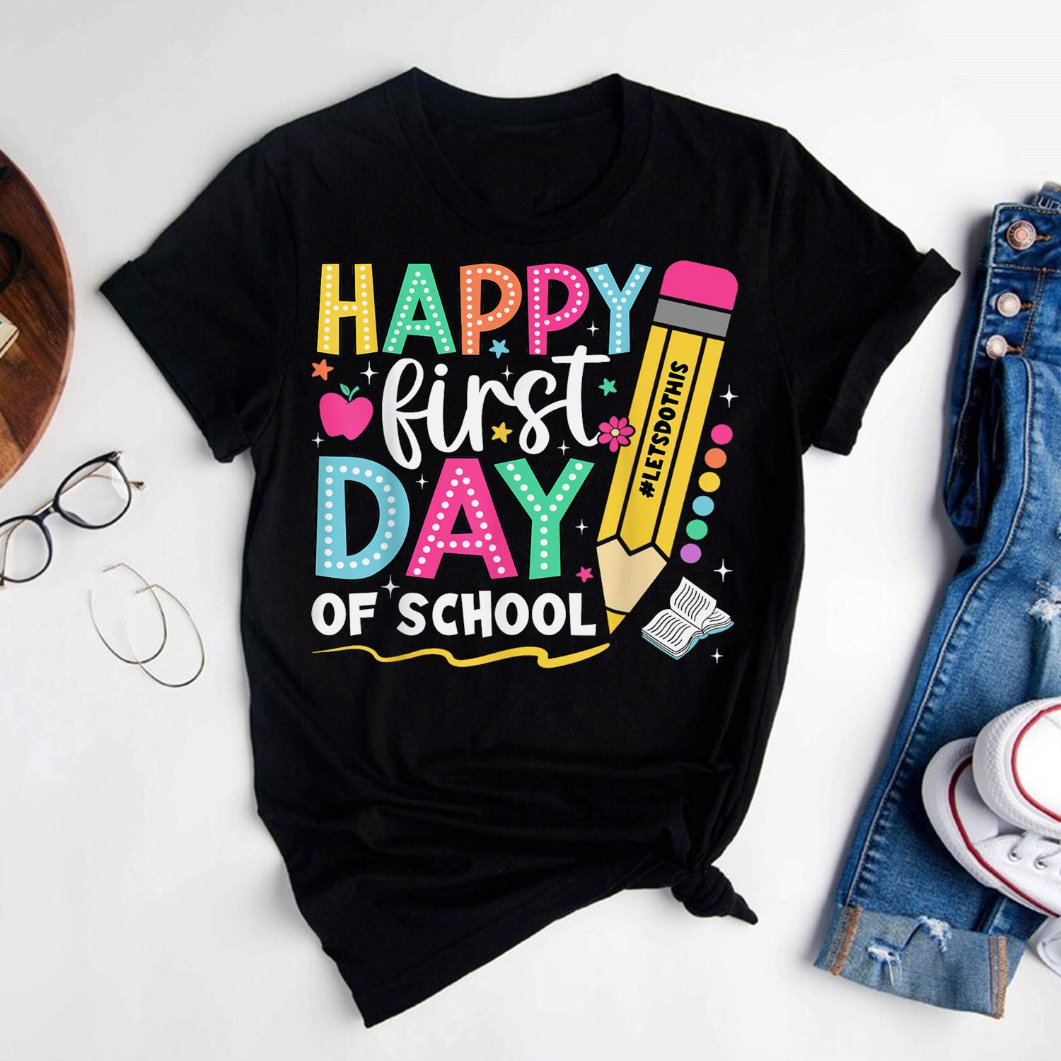 Happy_First_Day_Of_School_Pencil_Teacher_Back_To_School_Shirt_zccsga.jpg